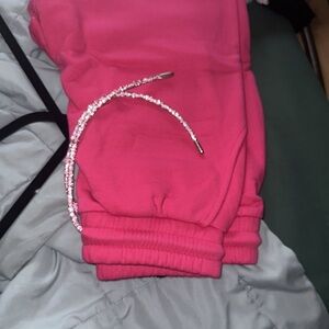 Brand new size small pink joggers w/ sparkly drawstring